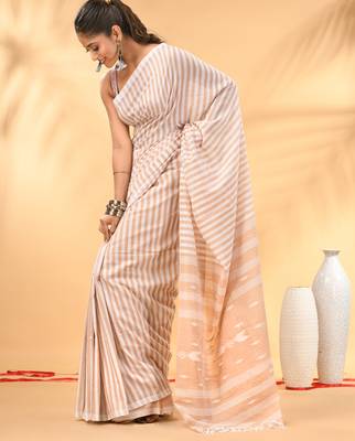 Beige and white handwoven cotton saree with all-over stripes and textured pallu 2