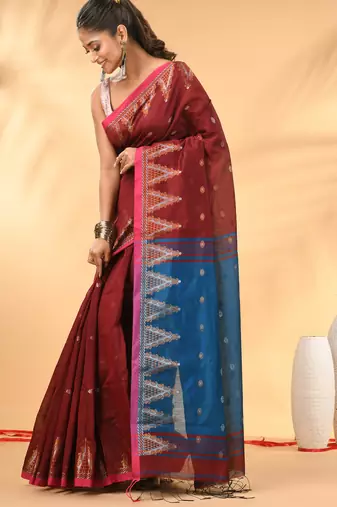 Maroon and blue cotton blend saree with ethnic motifs
