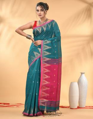 Teal and pink cotton blend saree with ethnic motifs 1