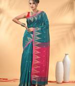 Teal and pink cotton blend saree with ethnic motifs