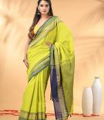 Lime green and navy blue cotton saree with geometric woven border