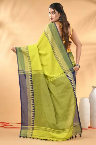 Lime green and navy blue cotton saree with geometric woven border