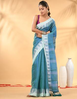 Sea green and white tissue saree with woven geometric border 1