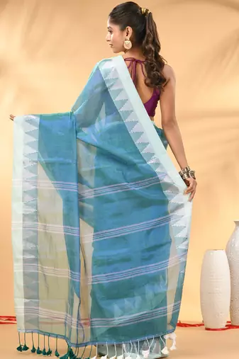 Sea green and white tissue saree with woven geometric border