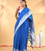 Sapphire blue and white tissue saree with woven geometric border
