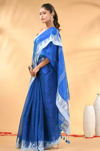 Sapphire blue and white tissue saree with woven geometric border