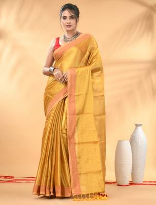 Yellow golden glow tissue saree 1