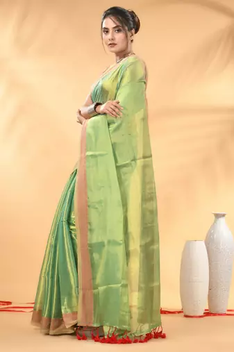 Sea green golden glow tissue saree
