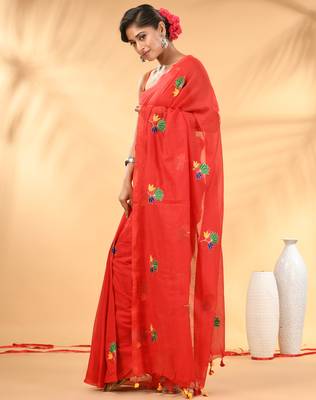 Red mulmul cotton saree with floral embroidery and tassel detailing 2