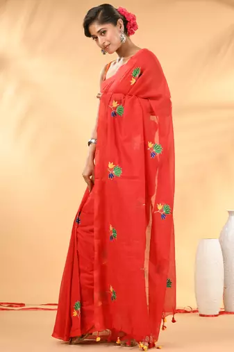 Red mulmul cotton saree with floral embroidery and tassel detailing