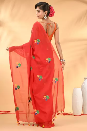 Red mulmul cotton saree with floral embroidery and tassel detailing