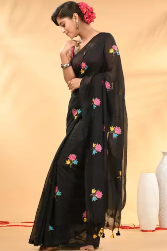 Black mulmul cotton saree with floral embroidery and tassel detailing