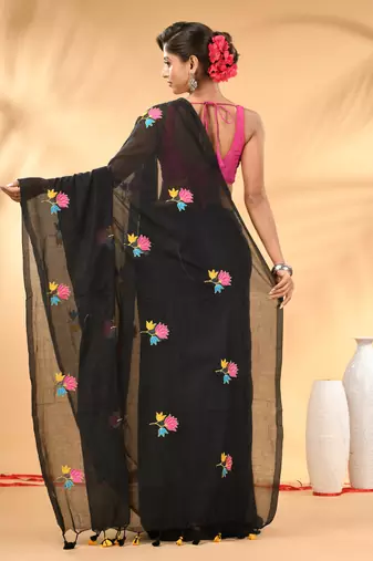 Black mulmul cotton saree with floral embroidery and tassel detailing