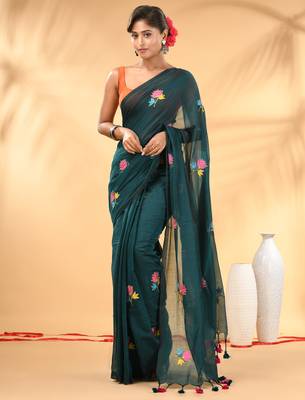 Teal mulmul cotton saree with floral embroidery and tassel detailing 1