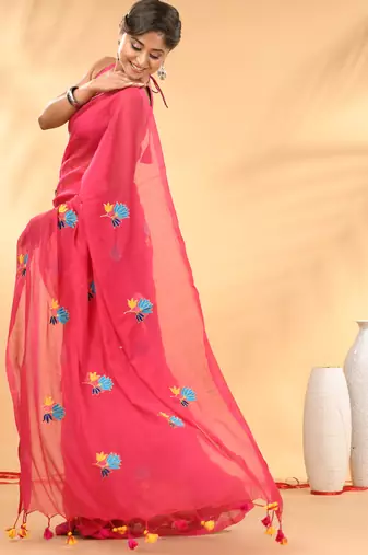 Rani pink mulmul cotton saree with floral embroidery and tassel detailing