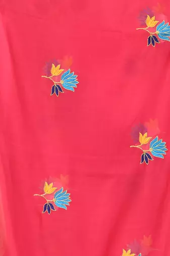 Rani pink mulmul cotton saree with floral embroidery and tassel detailing