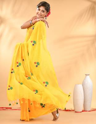 Yellow mulmul cotton saree with floral embroidery and tassel detailing 2