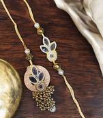 Traditional gold & pearl rakhi – luxurious designer rakhi for brother with
classic craftsmanship