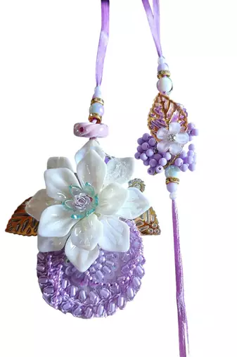 Handcrafted purple bloom rakhi for brother - elegant, traditional, and unique
design