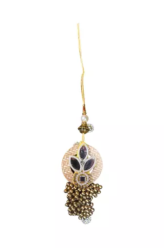 Traditional gold & pearl rakhi – luxurious designer rakhi for brother with
classic craftsmanship