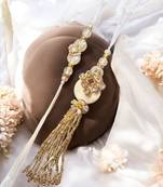 Traditional crystal & pearl rakhi – beautiful gold tassel design for brother and bhabhi