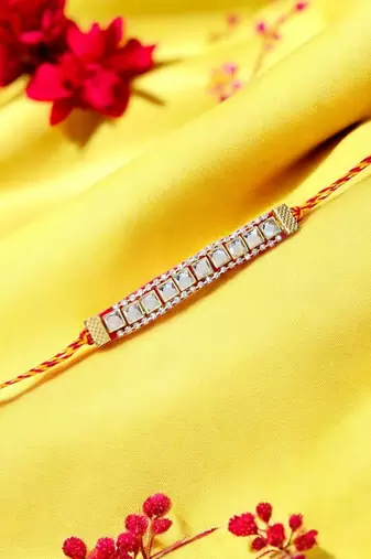 Royal mirror stone rakhi – elegant handcrafted rakhi with mirror stones for
brother