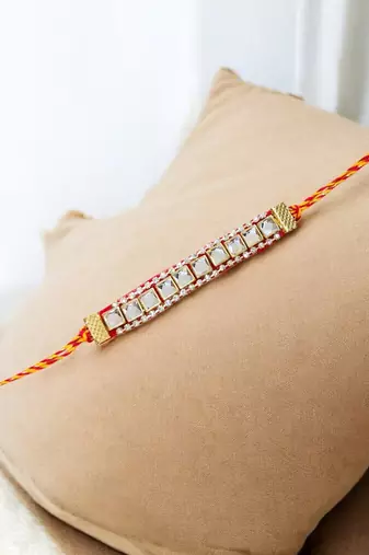 Royal mirror stone rakhi – elegant handcrafted rakhi with mirror stones for
brother
