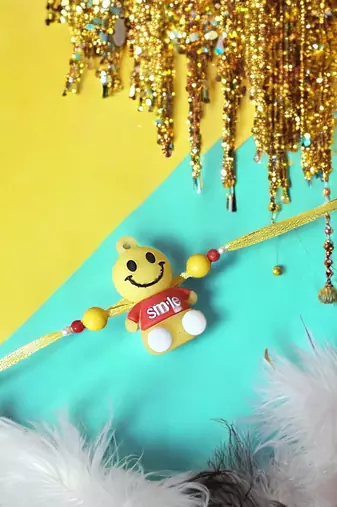 Smiley charm rakhi – fun and playful kids rakhi with bright smiley design
