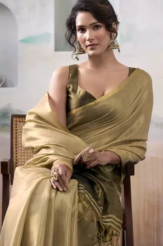 Cream tissue silk with beautiful tussle festival wear saree