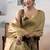 Cream tissue silk with beautiful tussle festival wear saree