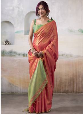 Salmon tissue silk with beautiful tussle festival wear saree 1