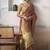 Rust tissue silk with beautiful tussle festival wear saree