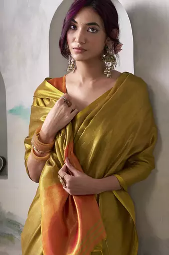 Golden tissue silk with beautiful tussle festival wear saree