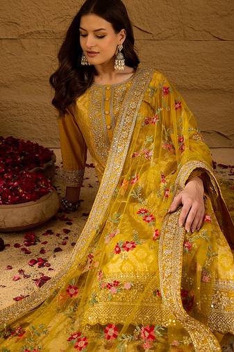 Women yellow silk blend solid woven design straight kurta trousers with dupatta