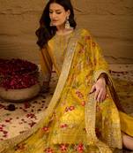 Women yellow silk blend solid woven design straight kurta trousers with dupatta