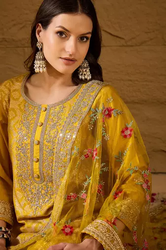 Women yellow silk blend solid woven design straight kurta trousers with dupatta