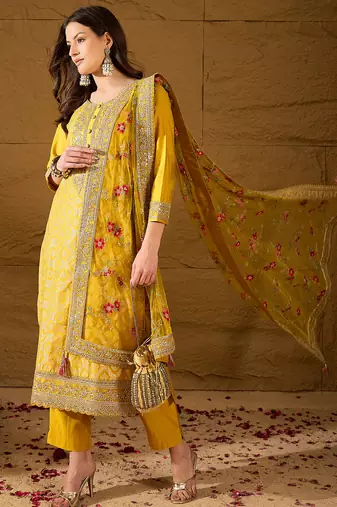 Women yellow silk blend solid woven design straight kurta trousers with dupatta