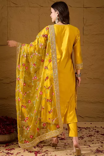 Women yellow silk blend solid woven design straight kurta trousers with dupatta