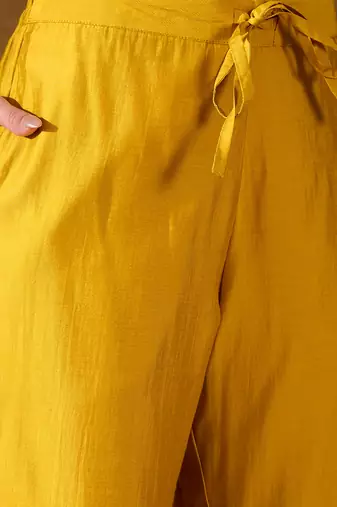 Women yellow silk blend solid woven design straight kurta trousers with dupatta