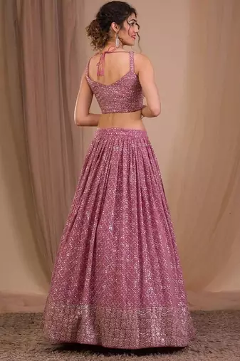Alluring Pink Sequins Georgette Engagement Wear Lehenga Choli