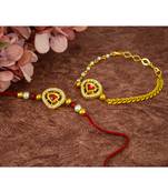 Raksha bandhan combo of red kundan rakhi and lumba set for bhaiya bhabhi with roli chawal and written greeting note.