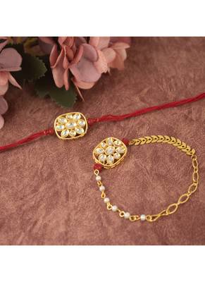 Combo of latest gold plated kundan rakhi for bhaiya bhabhi with roli chawal and written greeting note (red). 1