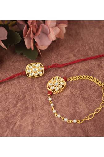 Combo of latest gold plated kundan rakhi for bhaiya bhabhi with roli chawal and written greeting note (red).