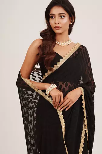 Black partywear sequinned embellished brasso saree