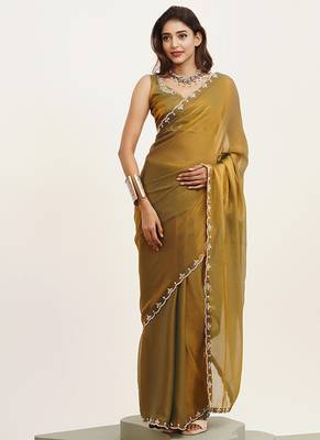 Metallic mustard partywear embellished beads and stones satin saree 1