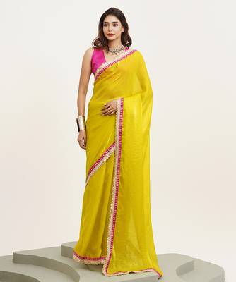 Metallic yellow partywear embellished sequinned satin saree 1