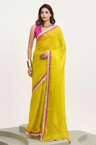 Metallic yellow color beautiful partywear embellished sequinned satin saree