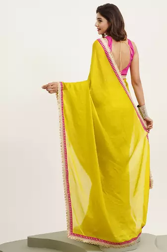Metallic yellow partywear embellished sequinned satin saree