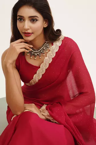 Red partywear embellished sequinned chiffon saree