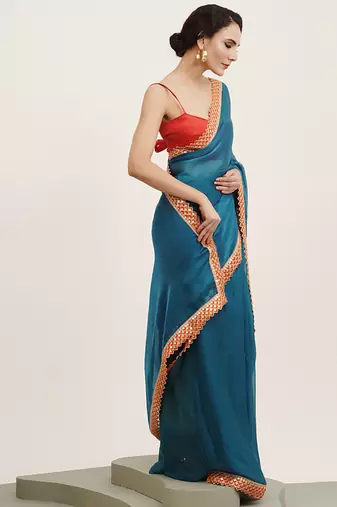 Teal partywear embellished sequinned chiffon saree